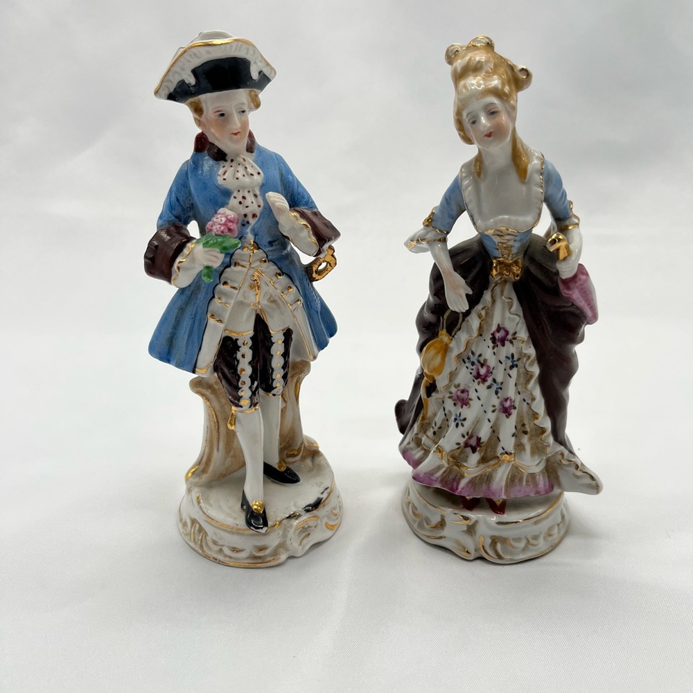 Elegant Porcelain Figurine with Floral Dress